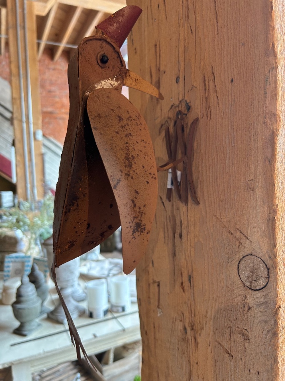 Charming metal woodpecker garden accent